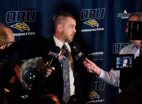 Coach Russell Springmann shares his vision and plans Friday for ORU’s basketball program with Tulsa news crews. 