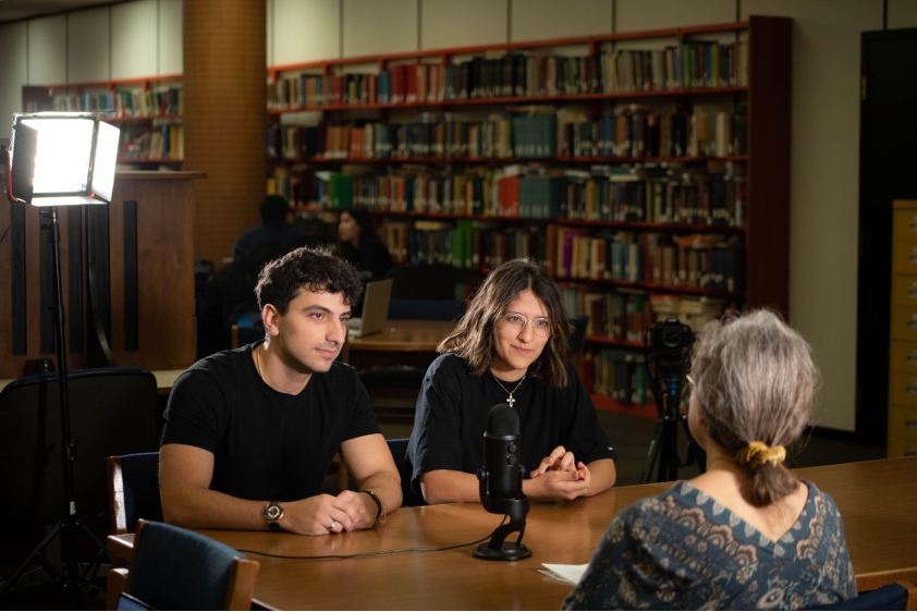 Jonathan Merheb, an engineering senior, and his sister Debora Merheb, a nursing junior, record a podcast episode interviewing ORU Adjunct Professor Sarah McCoy, an expert in anatomy and physiology.