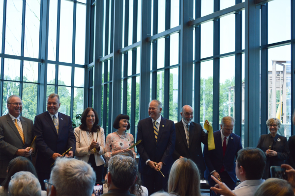 Oral Roberts University President William Wilson, center, dedicates the new $18 million J.D. McKean Library last week along with guest speakers and members of the Board of Trustees.
 
