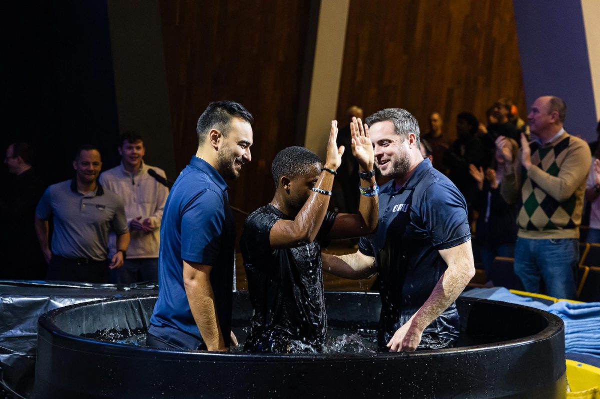 Panashe Duncan, a leadership development junior, is getting baptized.